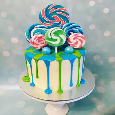 Pink & Chocolate Lollipop Cake - CakeCentral.com